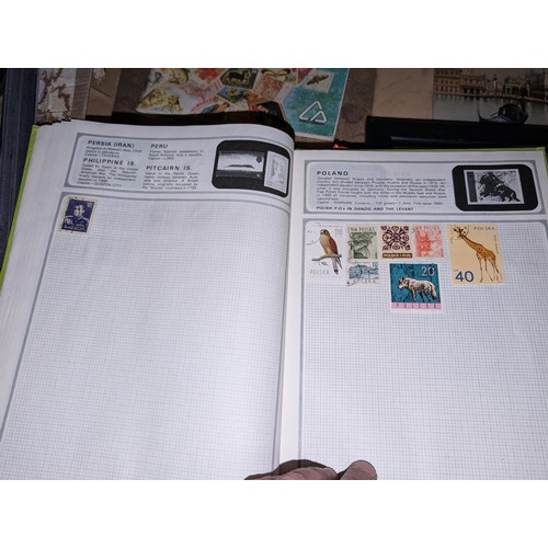 139 - Safari stamp album with stamps