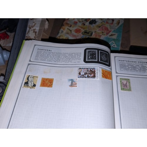 139 - Safari stamp album with stamps