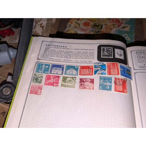 139 - Safari stamp album with stamps