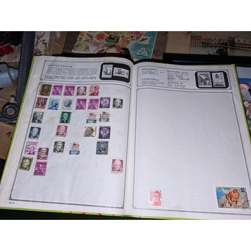 139 - Safari stamp album with stamps