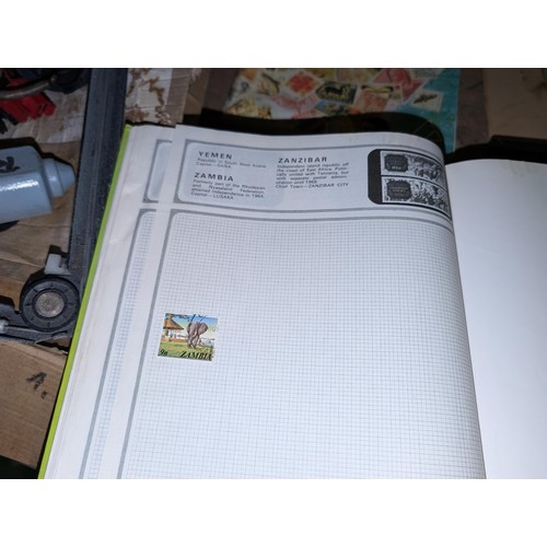 139 - Safari stamp album with stamps