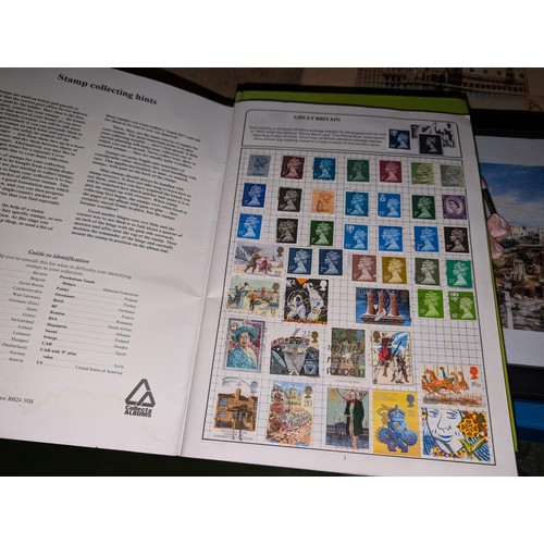 139A - The Globe master stamp album with stamps