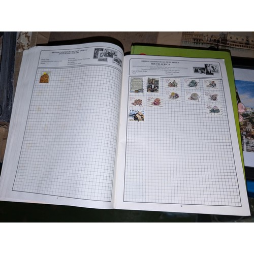 139A - The Globe master stamp album with stamps