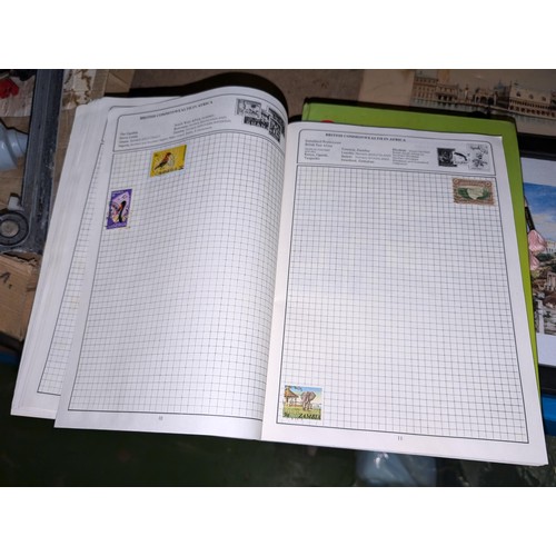 139A - The Globe master stamp album with stamps