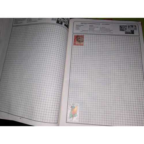 139A - The Globe master stamp album with stamps