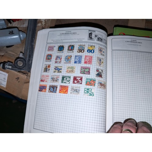 139A - The Globe master stamp album with stamps