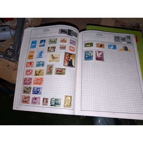 139A - The Globe master stamp album with stamps