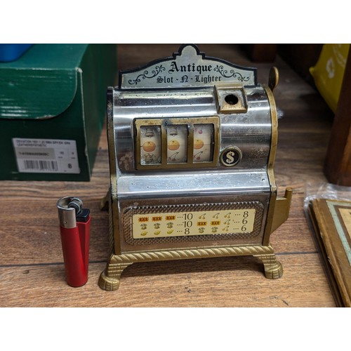 Waco Japan antique slot 'N' lighter, table lighter and slot machine