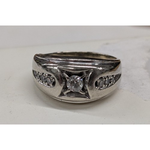 418 - Gents genuine 14 k white gold Gypsy ring with large central diamond with graduated trio (approx 1/3 ... 