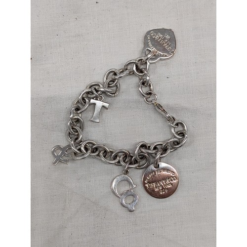 413 - 925 stamped 'Return to Tiffany' charm bracelet