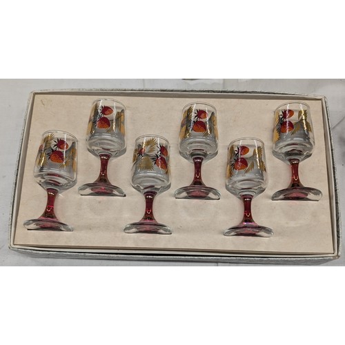 243 - Boxed as new vintage set of 6 strawberry with gold detailing and rim sherry glasses