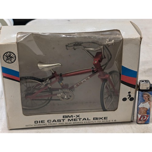 58 - Boxed as new 1980's 1/6 scale die cast working part BM-X bike