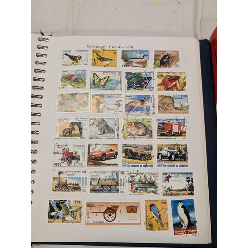 35 - Folder of modern stamps, Stanley Gibbons stamp catalogue and 2 x sheets of WWII christmas greeting a... 