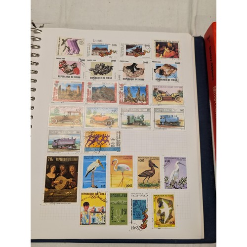 35 - Folder of modern stamps, Stanley Gibbons stamp catalogue and 2 x sheets of WWII christmas greeting a... 