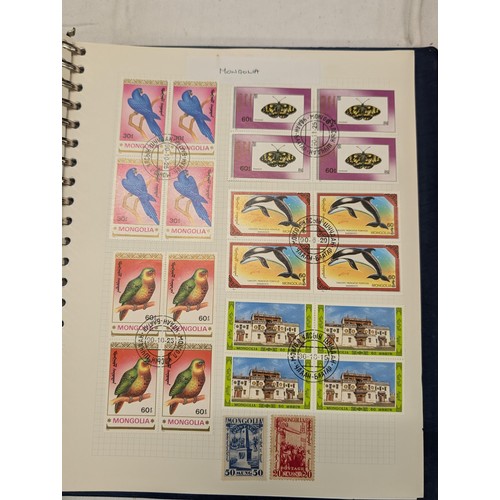 35 - Folder of modern stamps, Stanley Gibbons stamp catalogue and 2 x sheets of WWII christmas greeting a... 