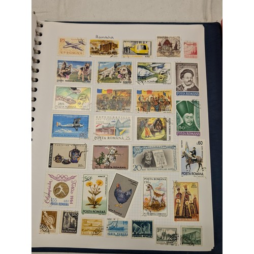 35 - Folder of modern stamps, Stanley Gibbons stamp catalogue and 2 x sheets of WWII christmas greeting a... 