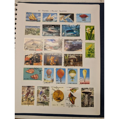 35 - Folder of modern stamps, Stanley Gibbons stamp catalogue and 2 x sheets of WWII christmas greeting a... 