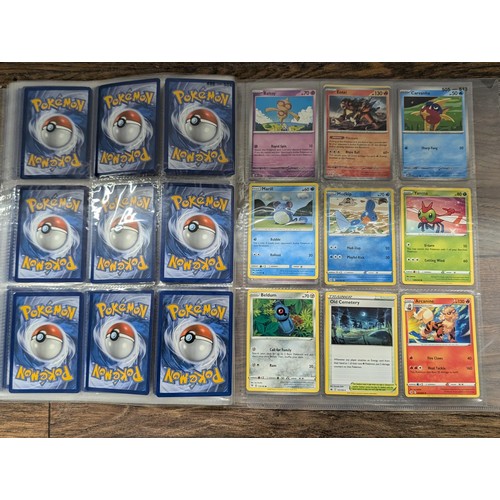 72 - Folder of 135 x assorted Pokemon trading cards