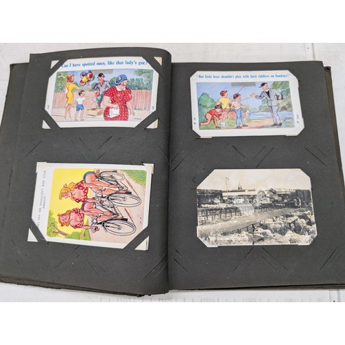 116 - Vintage postcard album with assorted saucy cartoon and other postcards and some old birthday cards e... 