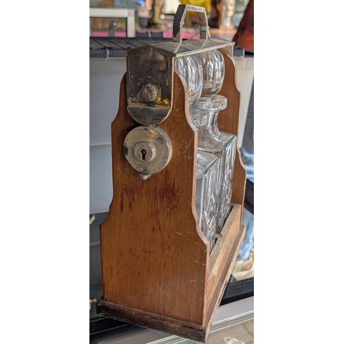 240 - Vintage PHV & Co wooden tantalus with twin cut crystal decanters - no key but open and each decanter... 