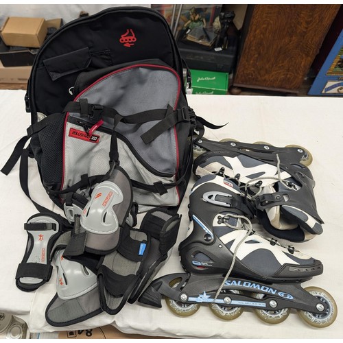 119 - Salomon Siam roller blades, size 6.5, in very good condition with Decathlon bag and guards