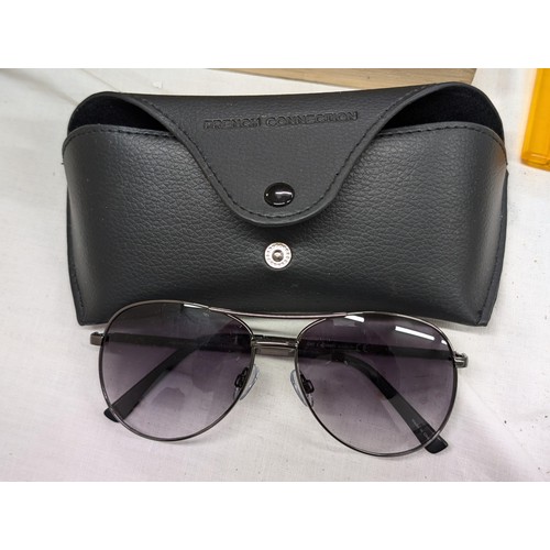 153 - Pair of as new French Connection mens sunglasses in case