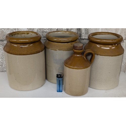 12 - Trio of stoneware pots/containers and small flagon with stopper