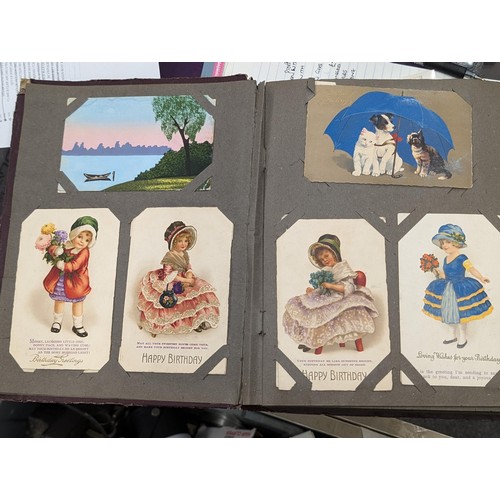 105 - Turn of the century postcard album 3/4 full of old postcards and greeting cards, Plus roughly 100 vi... 