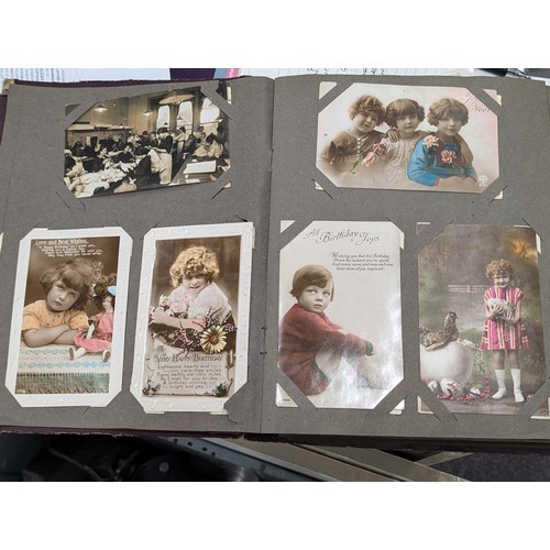 105 - Turn of the century postcard album 3/4 full of old postcards and greeting cards, Plus roughly 100 vi... 