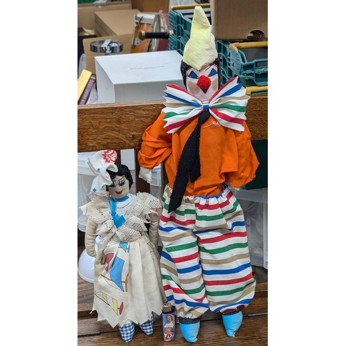 132 - Large male (approximately 2 ft tall) and smaller female rag doll clowns