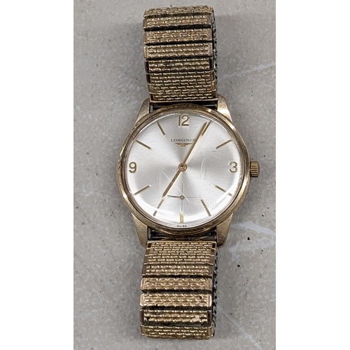 560 - Working vintage gents Longines 9 carat gold cased watch with elasticated strap