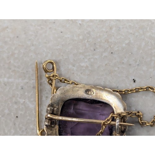 584 - 14 carat gold brooch with large amethyst gemstone surrounded by seed pearls - 5.7 gm