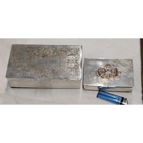 210 - 2 x Ornate silver plated old cigarette boxes