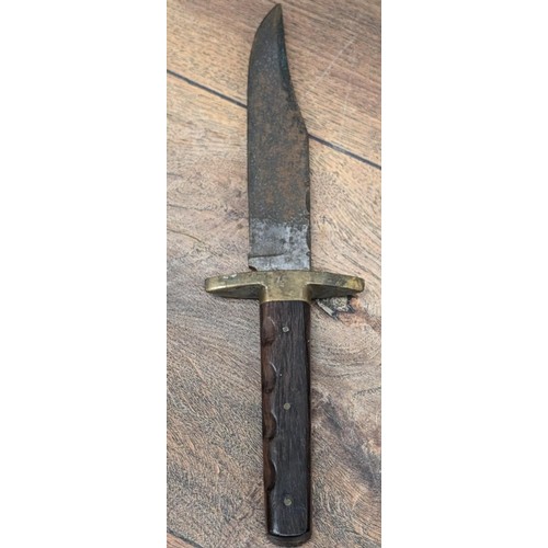 156 - Vintage bowie knife with wooden handle and brass hilt in leather sheath