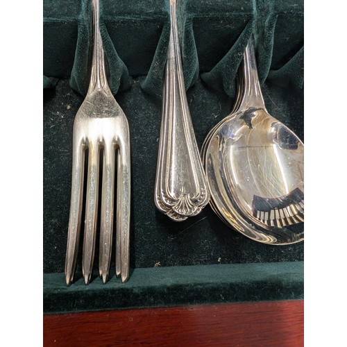 242 - EPNS warranted stainless canteen of cutlery in wooden case