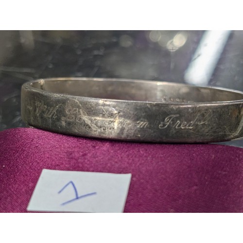 589 - Silver half engraved bangle with personal inscription on back - 15.5gm