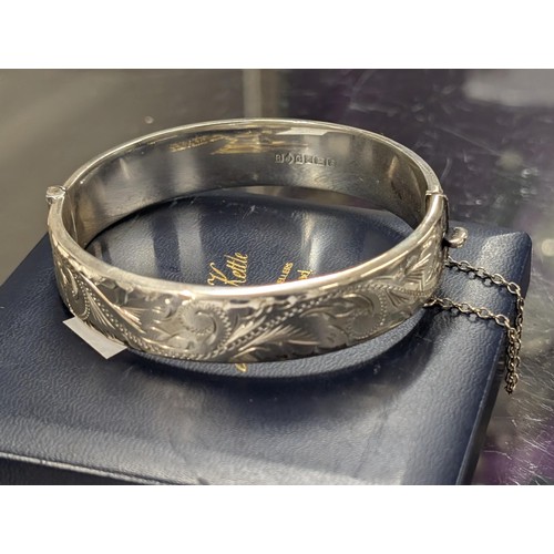 571 - Silver half engraved bangle - 19.2gm