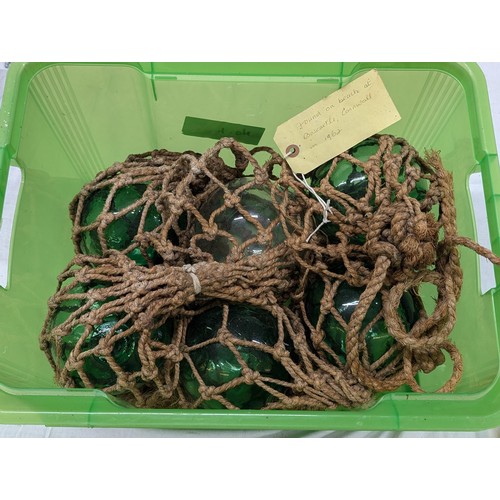 357A - 6 x vintage glass fishing floats in original rope nets.