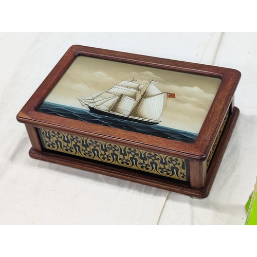 478 - 23 x 15 x 7cm jewellery box with reverse painted panels including one of a schooner