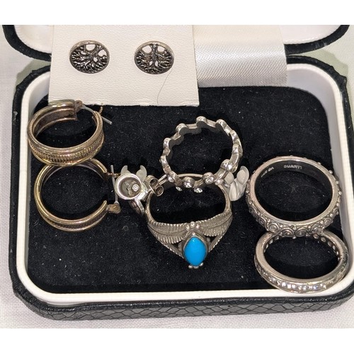 603 - 3 pairs of silver earrings and 4 x silver dress rings -  All proceeds from this lot goes to NSPCC.