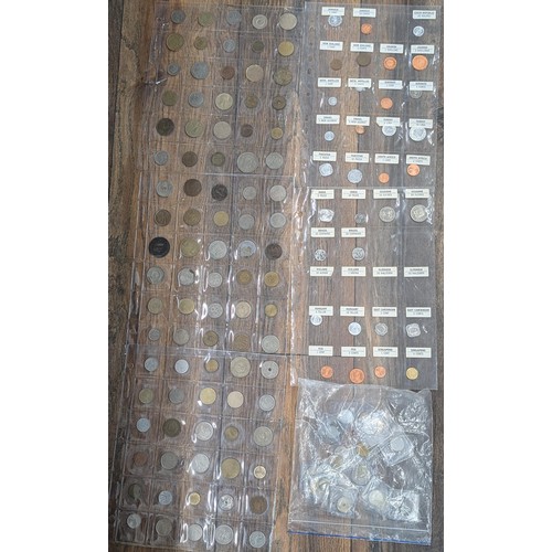 469 - 5 x sleeves of assorted mixed silver and copper foreign coinage plus bag of individually pouched sim... 