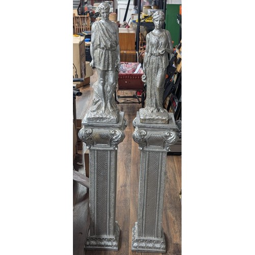 231 - Silver Greek male and female large composite statues on 2.5ft column stands