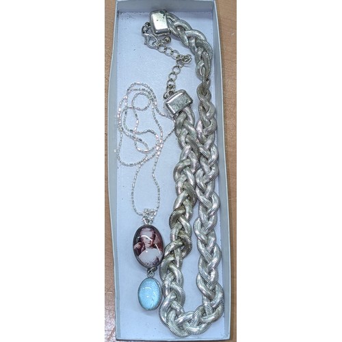 299 - White metal mounted picture pendant on 925 stamped silver chain plus other plaited silver plated nec... 