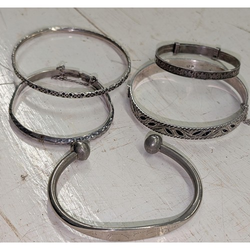 261 - 4 x silver bangles/bracelets with one other