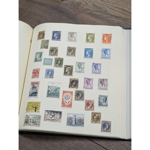 46 - Large stamp folder/album near full of stamps - small selection only photographed