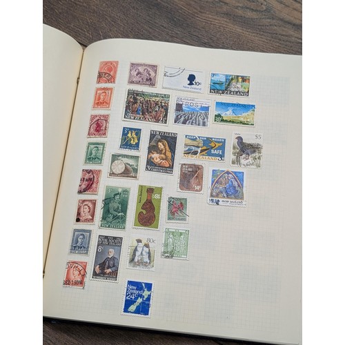 46 - Large stamp folder/album near full of stamps - small selection only photographed