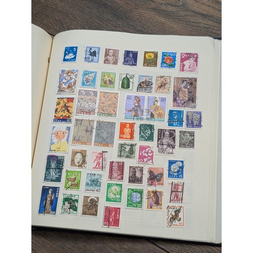 46 - Large stamp folder/album near full of stamps - small selection only photographed