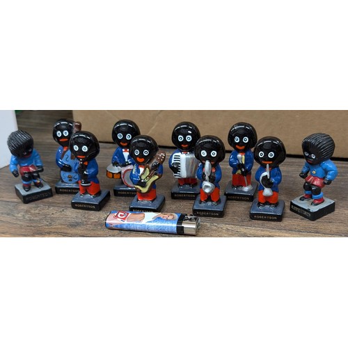 55 - Set of 8 ceramic Robertsons Golly jazz band and 2 vintage composite footballer figures