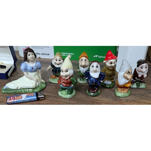 123 - Ceramic snow white and the 7 dwarfs figures