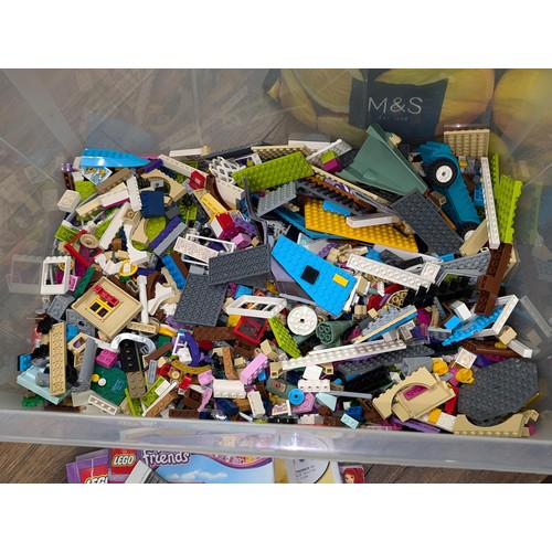 392 - Large storage box (lid broken) approximately 1/3 full of Lego friends loose building set etc